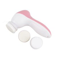 Pink 3-in-1 facial brush with rotating bristle head and circular pads, close-up