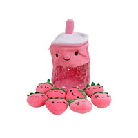 Bubble tea plush cup with lid and smiling face, with strawberry plush pieces around