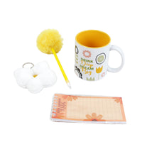 Garden gift set with mug, yellow pom-pom wand, plush flower keychain, and lined notepad