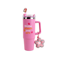 Pink insulated tumbler with handle, screw lid, and dangling flower charm