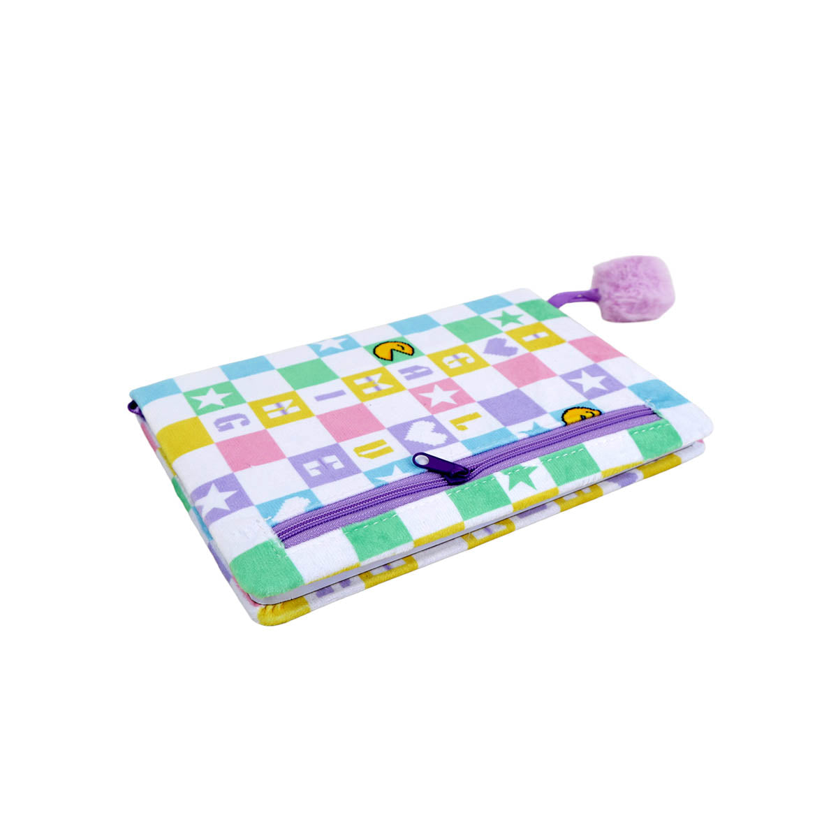 Folded notebook with colorful pixel-pattern cover and purple pom-pom tassel