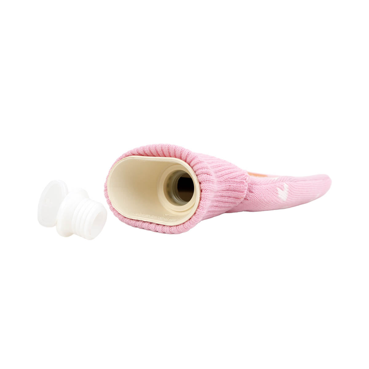 Pink knit hot water bottle sleeve with plug and opening for filling