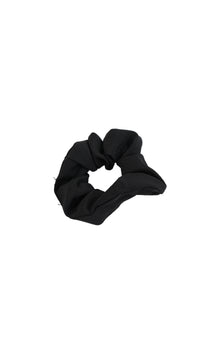 Black fabric hair scrunchie with gathered loops and elastic band