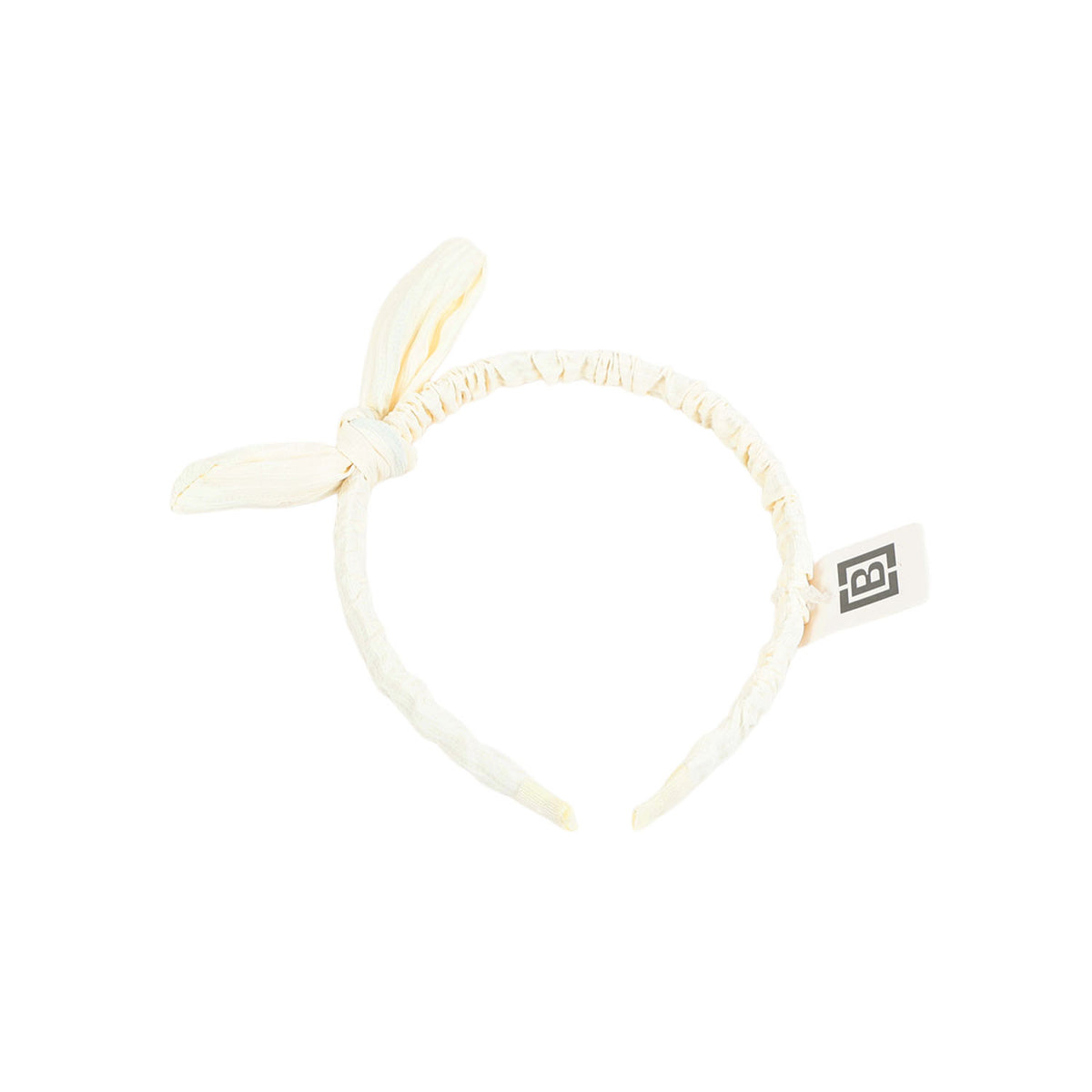 White fabric headband with bow and ear-like details