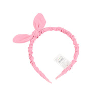 Pink fabric headband with bow and ear-like details