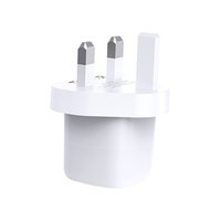 White UK plug adapter with two metal prongs and protective plastic body
