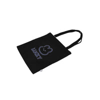Black tote bag with blue bear icon and 'LUCKY' text, shown at an angle