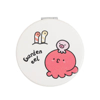 White round double-sided leather mirror with garden eel illustration
