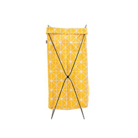Yellow fabric storage bag with iron frame, side view, X-braced base