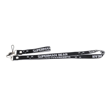 Black phone lanyard with metal clips and repeating SUPERMAN BEAR lettering