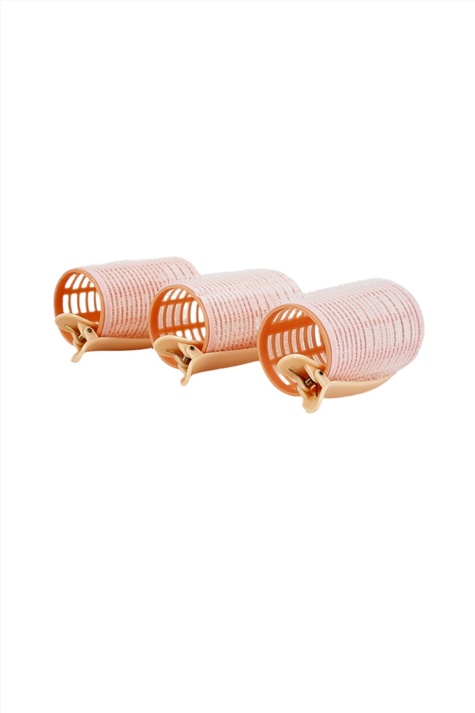 Hair roller set of three light pink cylinders with beige clips