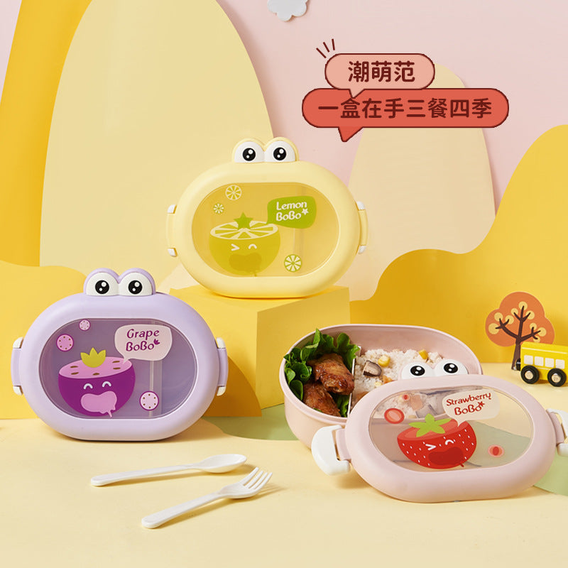 Yellow kids lunch box with lemon cartoon, character eyes, and two side handles