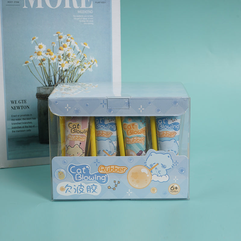 Boxed cat bubble blower set with blue tubes and yellow wands