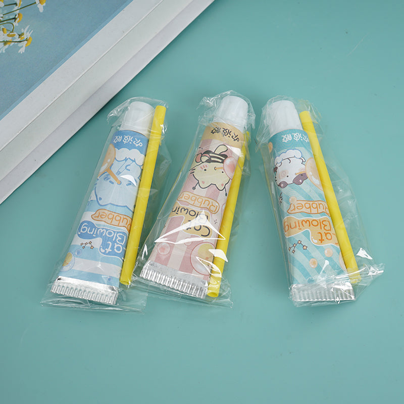 Pack of cat bubble blower tubes with yellow wands, sealed in clear sleeves