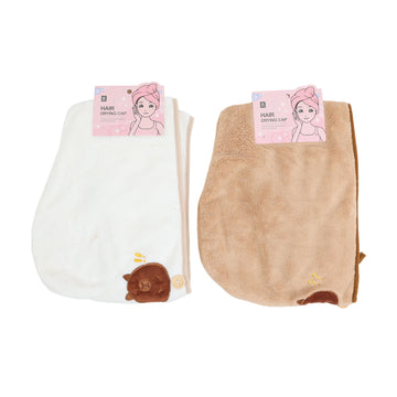 White hair drying cap towel with capybara face patch and small button detail