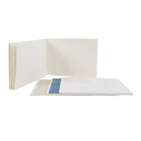 Painting notes book opened, stacked pages with blue divider and writing space