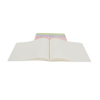 Open pastel painting book with blank white pages and Nature's Palette cover visible