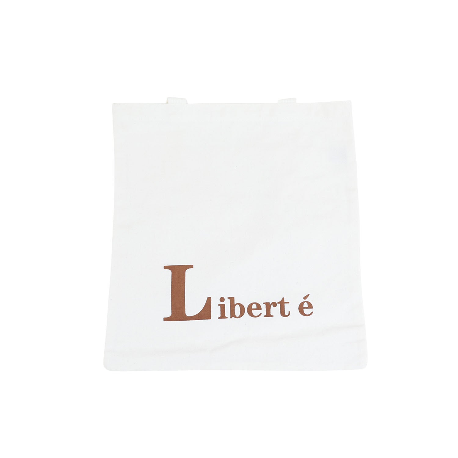 White canvas shoulder bag with brown 'Liberté' lettering