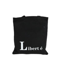 Black canvas shoulder bag with 'Liberté' lettering