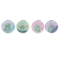 Set of four round compact mirrors with cute dino prints, blue, mint, pink, and lavender