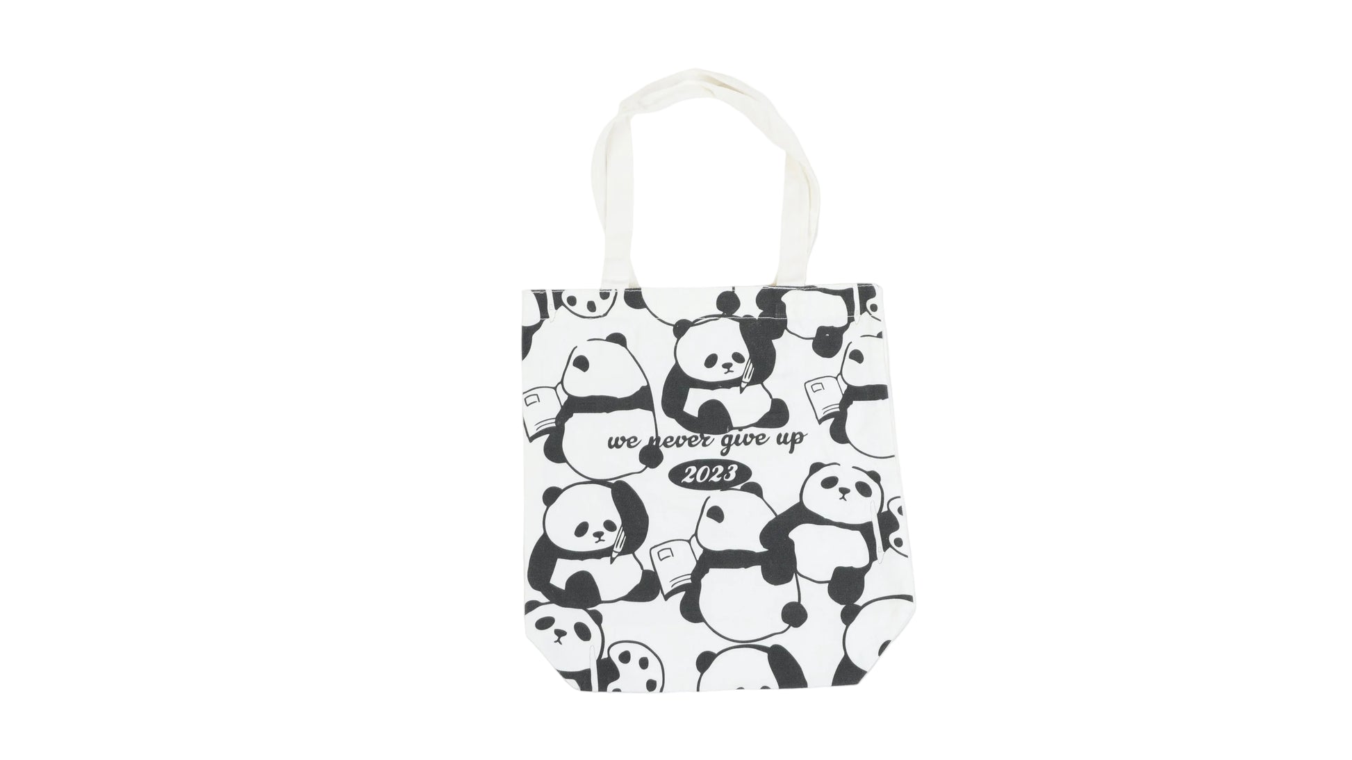 White canvas shoulder bag with all-over panda pattern and 'we never grow up 2023'