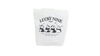 White canvas shoulder bag with 'LUCKY NINE' panda graphic and text