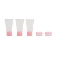 Pink travel squeeze bottles with bases and two round caps, five-piece set