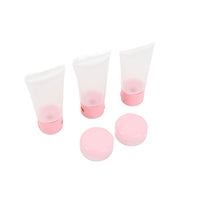 Pink travel squeeze bottles and round caps, five-piece set with flip lids