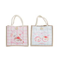 Two pet fashion handbags: pink and blue checkered designs with bow-knot cartoon pets, top handles