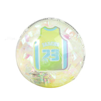 Iridescent yellow-green basketball bouncy ball with player name and number graphic