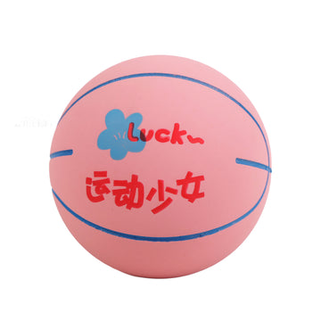 Pink 6 cm hollow basketball with blue seam lines and a playful printed design on a white background.