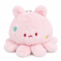 Pink plush keychain with embroidered face, teal star patch and yellow accent