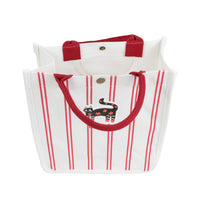 Red-striped pet handbag with cat applique and red top handles