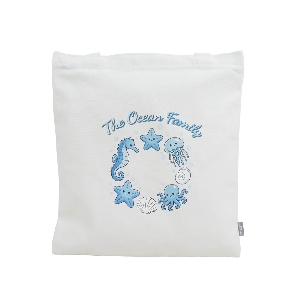 White canvas tote with blue ocean fairy print and small side label tab