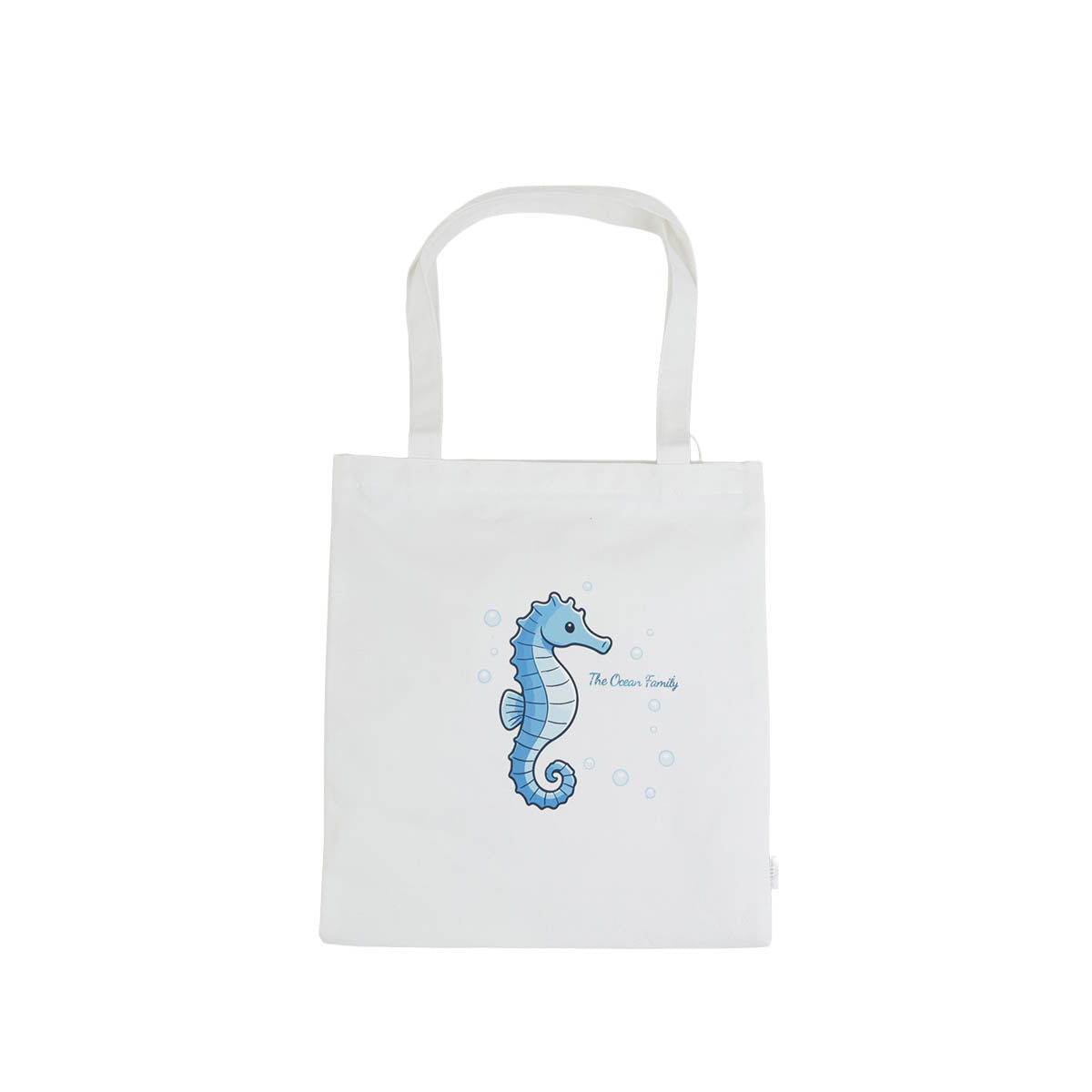 White canvas shoulder bag with blue seahorse graphic on the front panel
