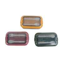 Set of three lunch boxes: maroon, olive green, and yellow with clear windowed lids.