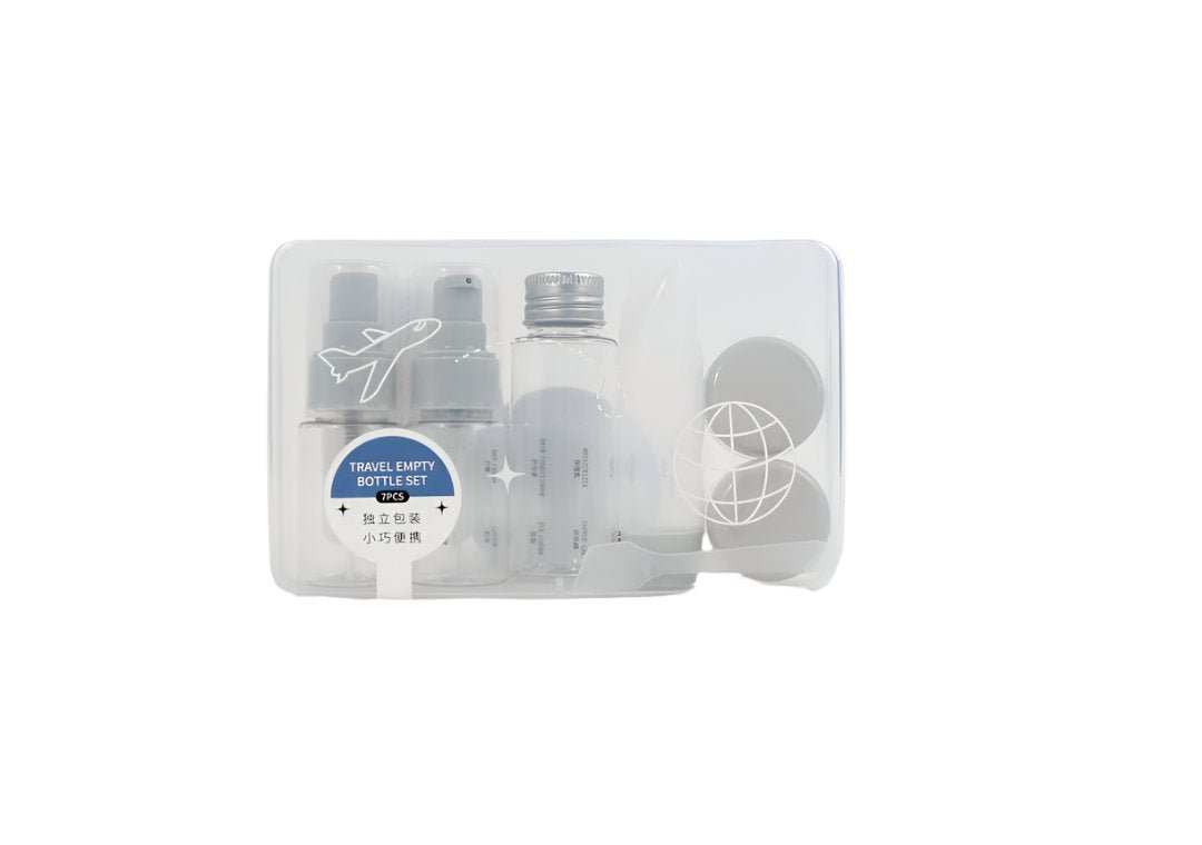 Travel empty bottle set in a clear organizer case with white lids and bottles