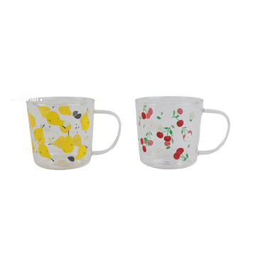 Two clear glass mugs displayed side by side, one with yellow fruit and one with red cherry prints