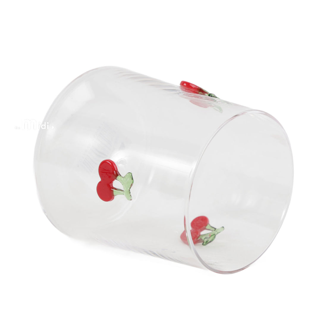 Clear glass tumbler, angled view, with red cherry icons and open rim