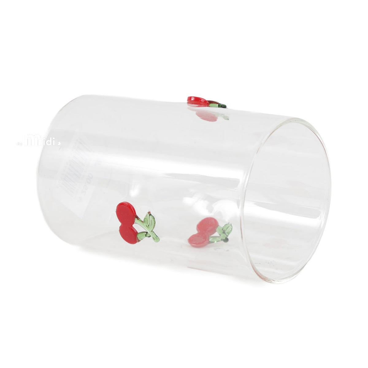 Clear glass tumbler with red cherry icons, angled view