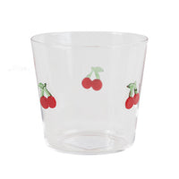 Clear short glass cup with red cherry motifs, shown upright with a gently flared rim