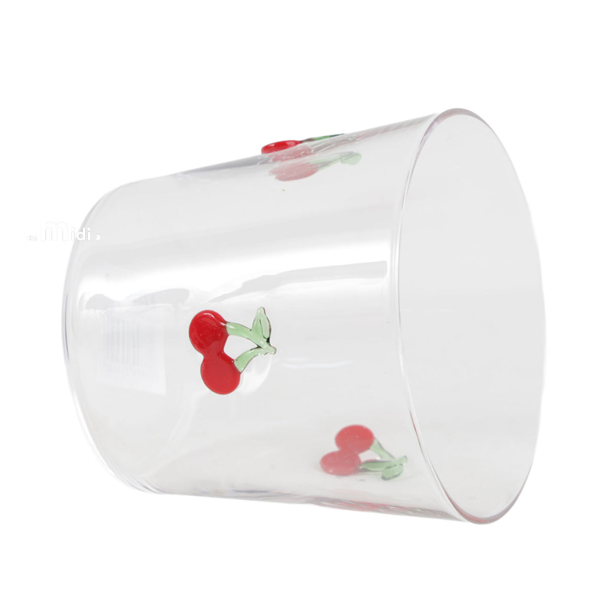 Clear short glass cup with cherry motifs shown at an angle, with its open rim visible