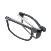 Foldable reading glasses folded with black hinge, showing frame and temples