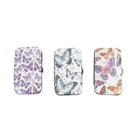 Butterfly manicure case with purple butterfly pattern, zipper closure.