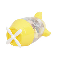 Yellow rocket-shaped bottle with clear window and white propeller, filled with mini bottles