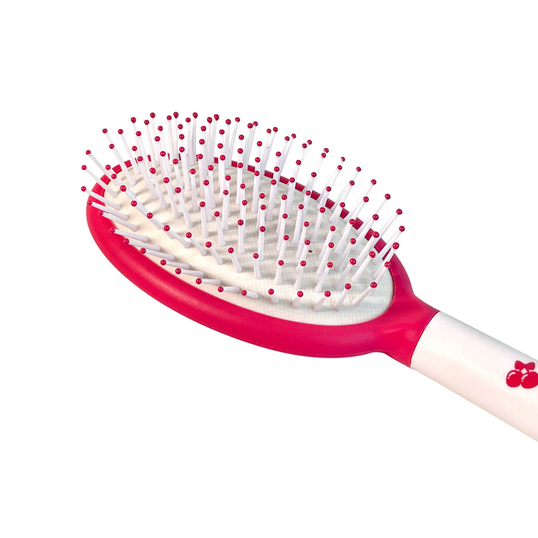 Air-cushion hair brush with white bristles in oval pink pad and comfort handle
