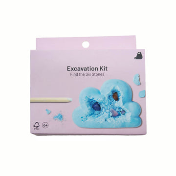 Excavation kit package with blue cloud fossil graphic and included tools