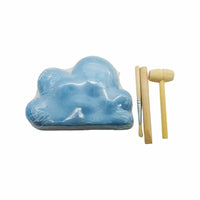 Blue cloud-shaped fossil with wooden excavation tools