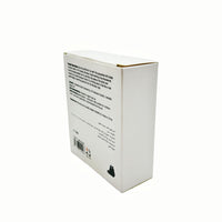 White product box back with printed safety text and small dinosaur logo