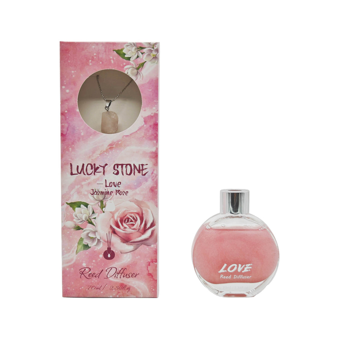 Reed diffuser set with pink bottle and crystal pendant, with three black reeds